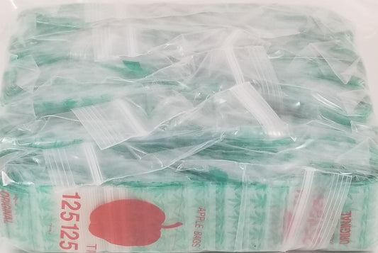 Original Apple Bags resealable bags with leaf design, measuring 1.25 x 1.25 inches, ideal for storing small items.