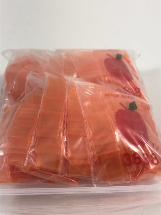 Orange 3/8" x 3/8" resealable bags by Original Apple Bags, made of durable plastic for secure storage and packaging.