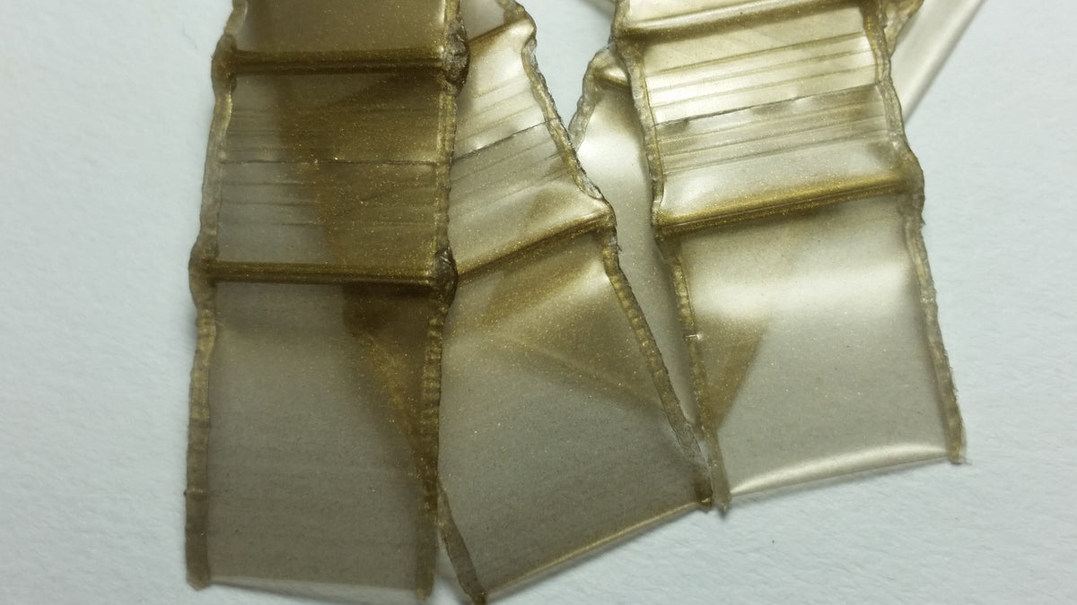 Resealable gold apple-shaped bags with 3/8-inch size from Original Apple Bags, ideal for packaging and storage.