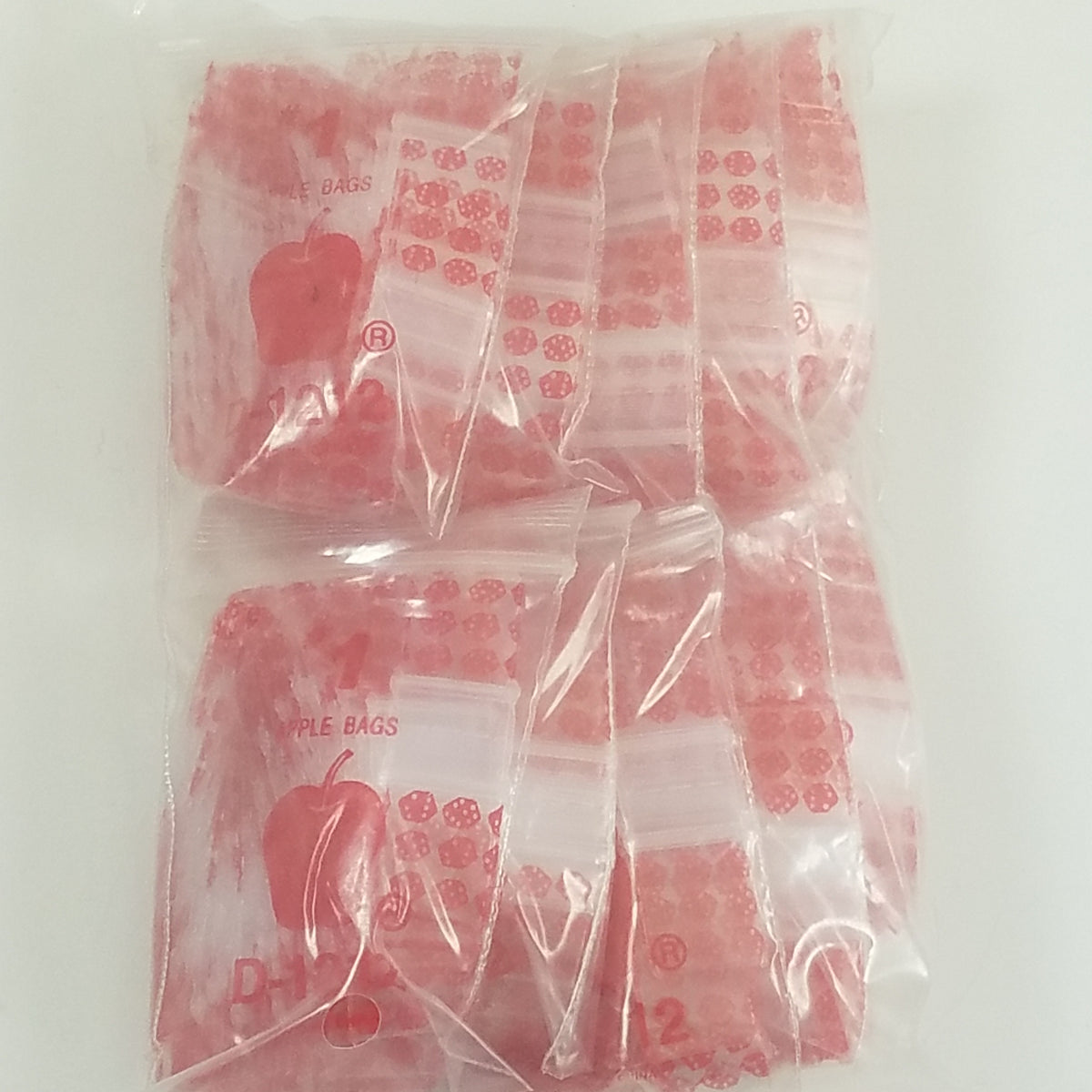 Red dice design resealable Apple Bags, 1/2" x 1/2" size, made by Original Apple Bags, ideal for small item storage and packaging.