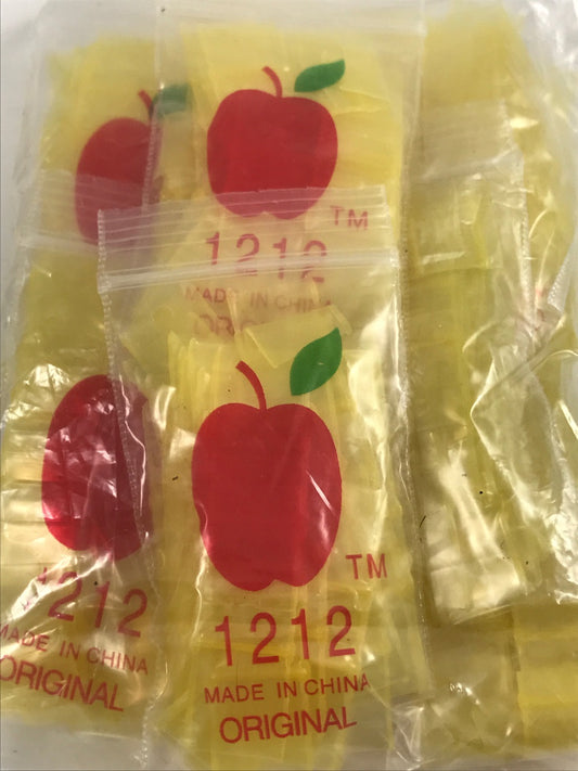 Yellow 1/2" x 1/2" resealable bags by Original Apple Bags, perfect for storing small items or food.