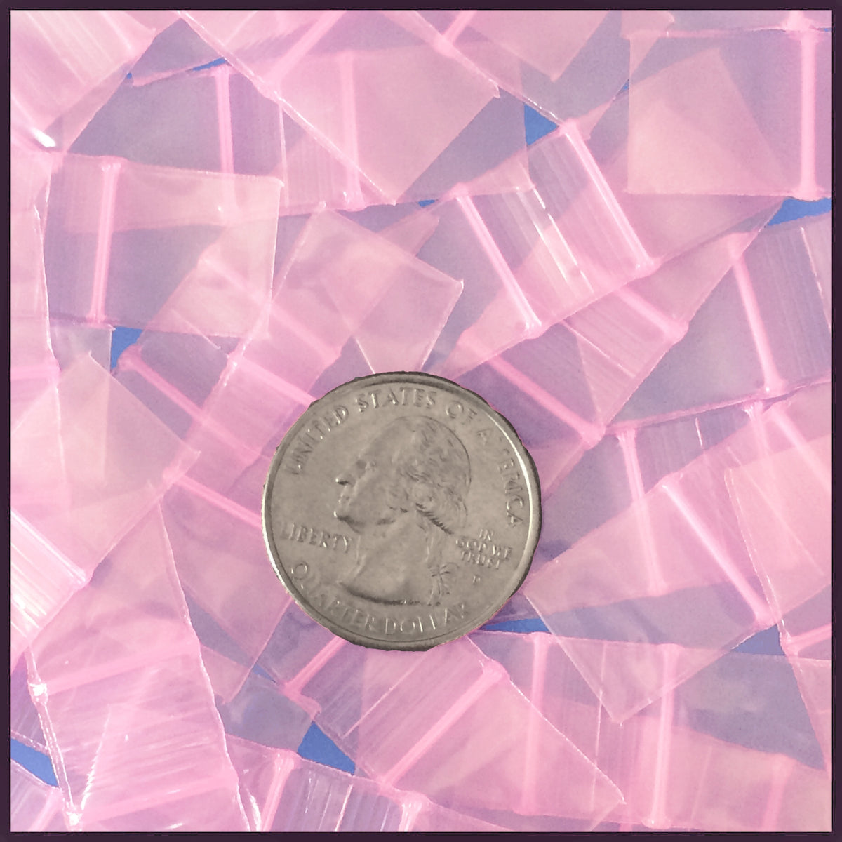 Resealable pink Apple Bags 5/8 x 5/8 inches, made by Original Apple Bags, shown in a close-up image.