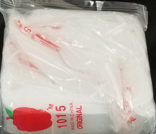 Clear resealable Apple Bags, 1" x 1.5", from Original Apple Bags, shown with the transparent, resealable plastic bags for storage.