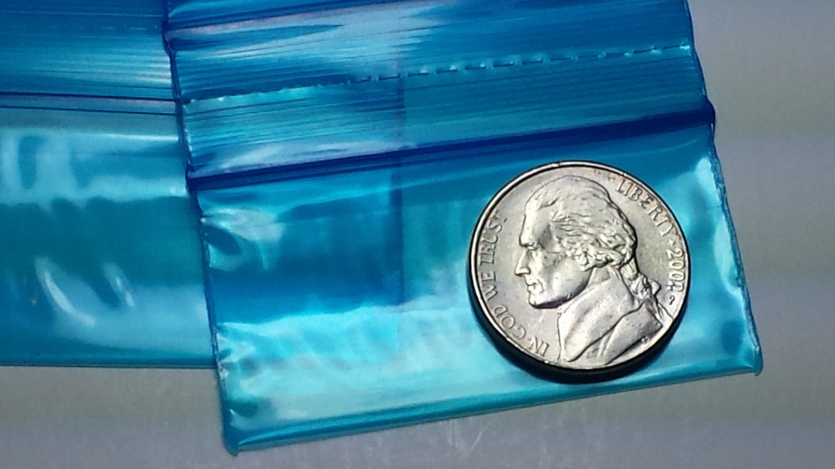 Blue 2x1-inch resealable bags from Original Apple Bags, ideal for storing small items or packaging.