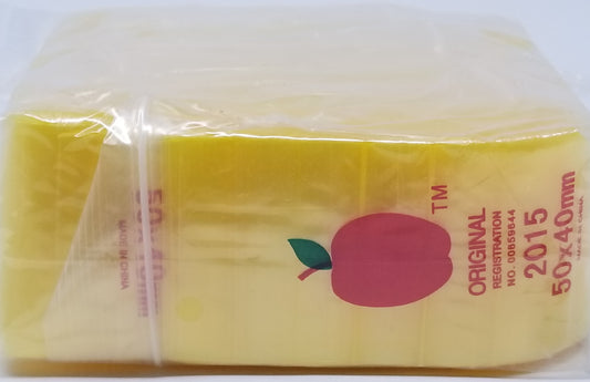 Yellow 2015 Original Apple Bags resealable bags, 2x1.5 inches, made by Original Apple Bags for storing small items.