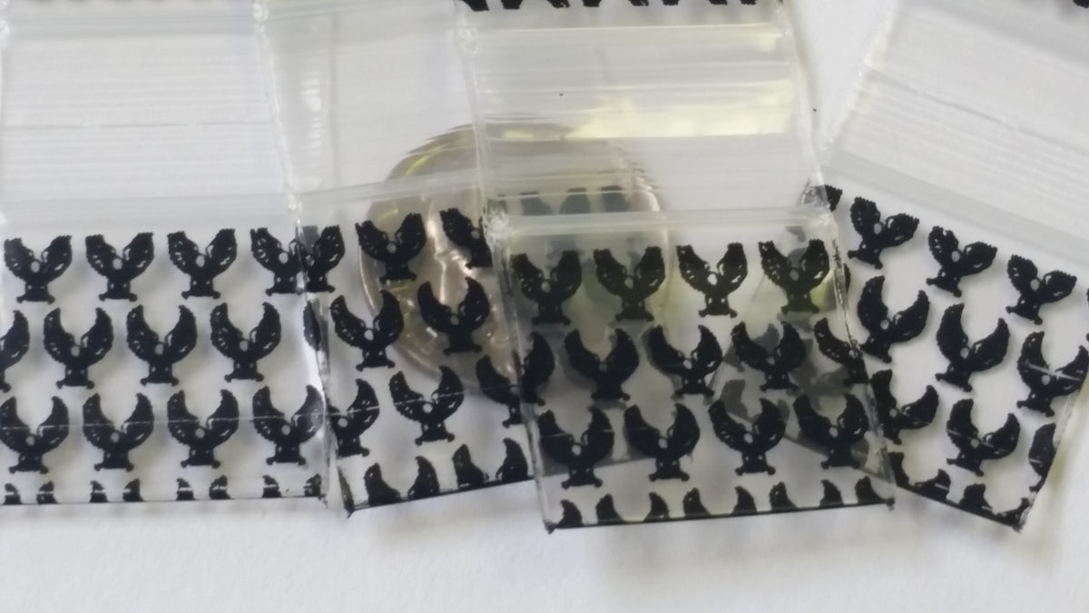 Original Apple Bags resealable bags, 3/4" x 3/4" size, featuring the Eagle brand logo and clear material for storage.