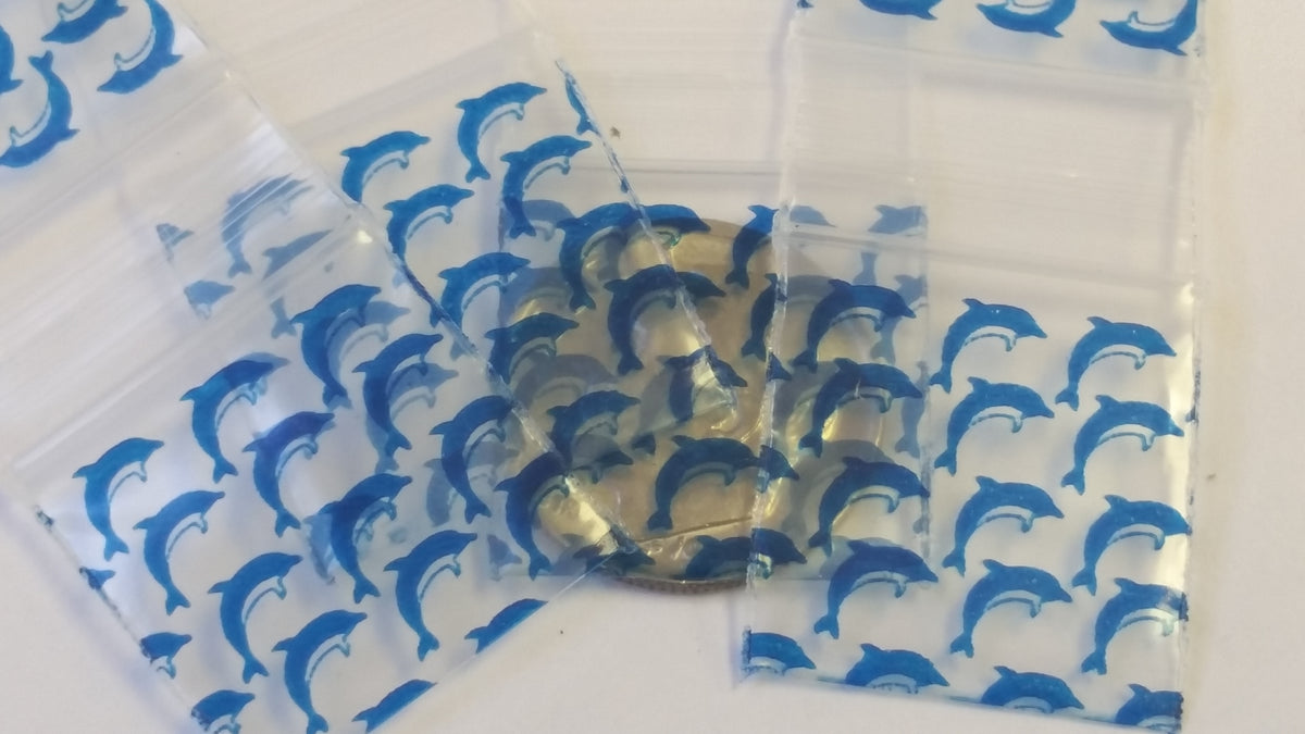 Original Apple Bags resealable bags with dolphin design, 3/4 inch by 3/4 inch, ideal for storage and organization.