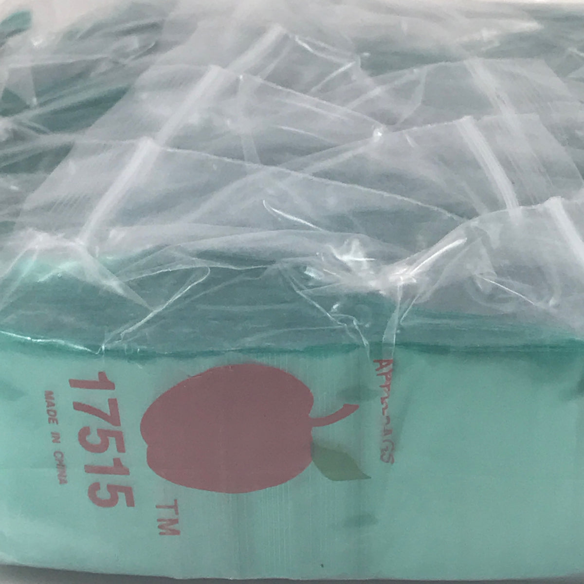 Green 1.75 x 1.5-inch resealable bags from Original Apple Bags, ideal for packaging and storage.
