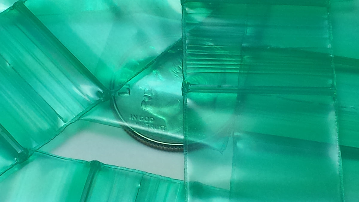 Green 3/4" x 3/4" resealable bags from Original Apple Bags, ideal for storing small items or packaging.