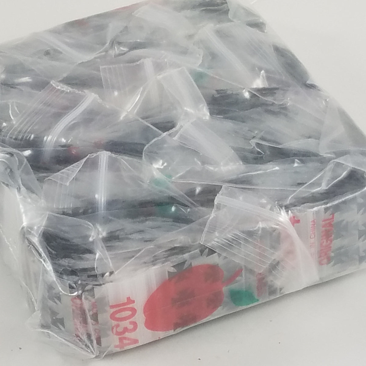 Original Apple Bags resealable chopper bags, 1" x 3/4" size, clear plastic storage with secure resealable closure.