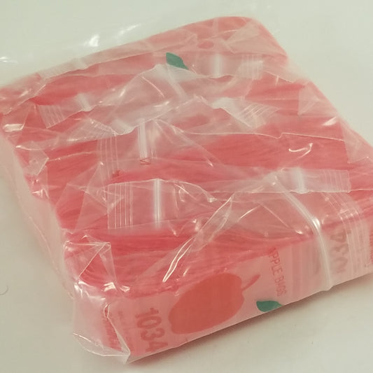 Pink resealable bags from Original Apple Bags, 1 inch by 3/4 inch, ideal for packaging and storage.