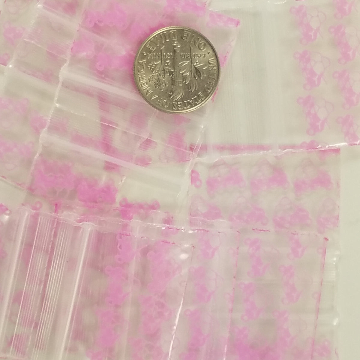 Pink Panther resealable bags from Original Apple Bags, 1.25 x 0.75 inches, perfect for storing small items.
