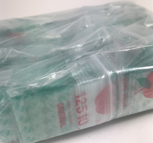 Original Apple Bags resealable bags with dollar sign $ design, 1.25" x 1" size, ideal for packaging or storage.