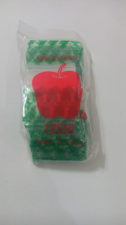 Original Apple Bags resealable bags, 1.25" x 1", with Clover design, ideal for storing small items or snacks.