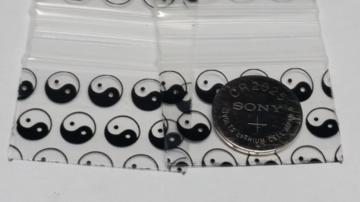 Original Apple Bags resealable bags featuring Taiji/Yin Yang design, measuring 1.5" x 1" with a natural, clear appearance.