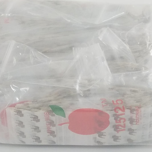 Original Apple Bags resealable bags, 1.25 x 1.25 inches, durable plastic packaging for small items or snacks.