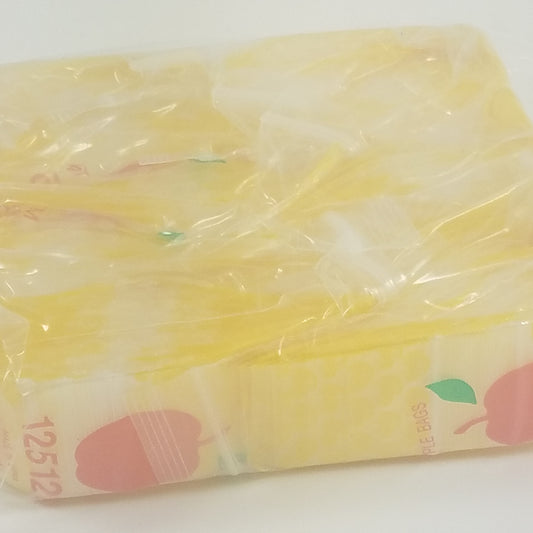 Original Apple Bags resealable bags, 1.25" x 1.25" taxi cab design, perfect for packaging small items or collectibles.