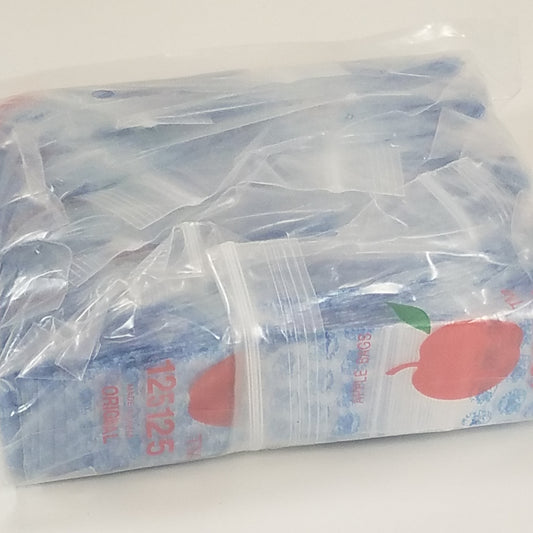 Original Apple Bags resealable bags in smoke and fly design, 1.25" x 1.25" size, suitable for storing small items or candies.