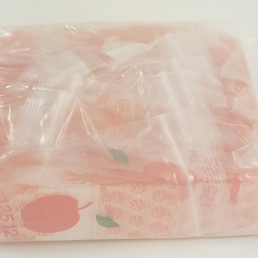 Resealable Original Apple Bags with basketball design, 1.25 x 1.25 inches, ideal for small items or snacks.