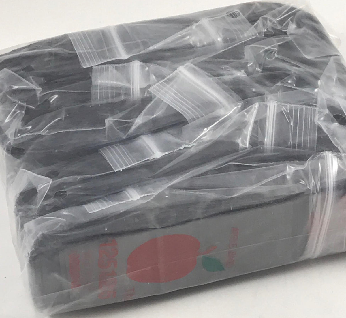 Black 125125 Original Apple Bags resealable bags, 1.25 x 1.25 inches, made by Original Apple Bags for storage and packaging.