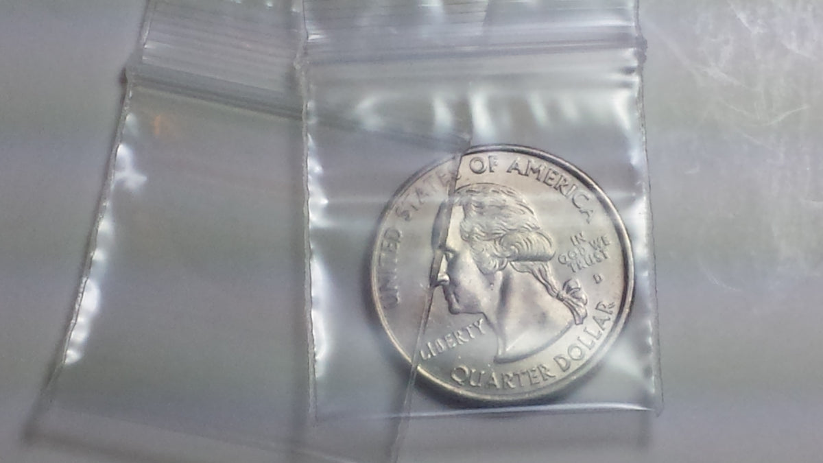 Clear resealable bags from Original Apple Bags, 1.25 x 1.25 inches, perfect for storage and organization.
