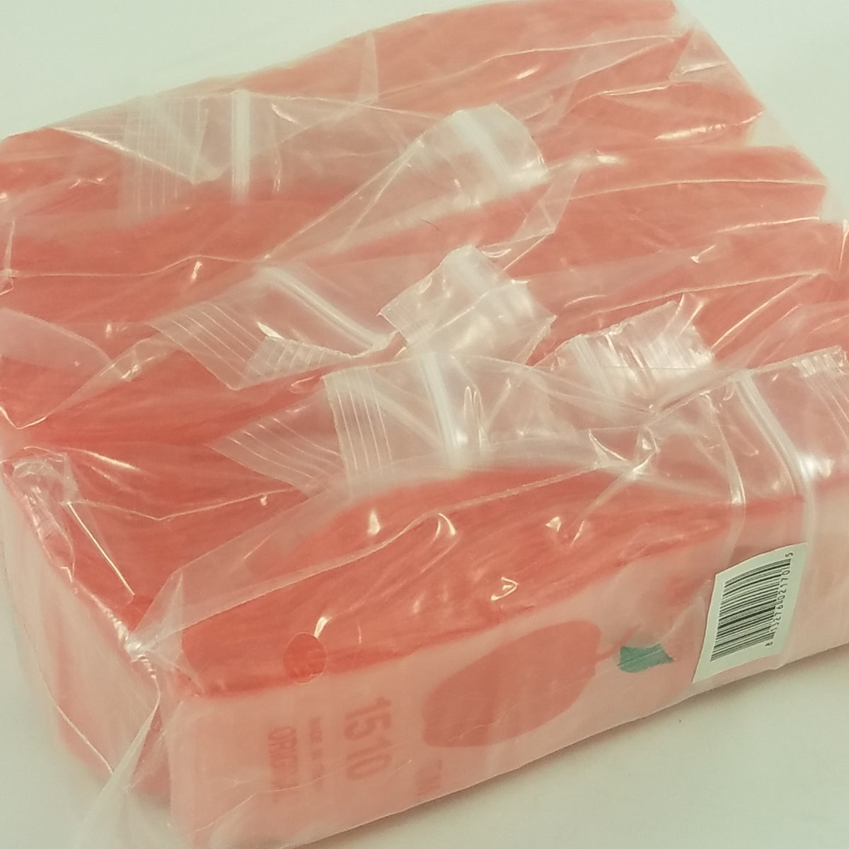 Red 1.5x1-inch resealable apple bags by Original Apple Bags, featuring durable packaging for fresh fruit storage.