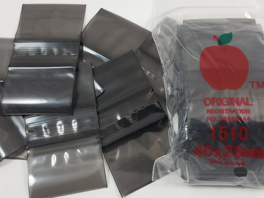 Black resealable Apple Bags by Original Apple Bags, 1.5" x 1", designed for secure storage and packaging.
