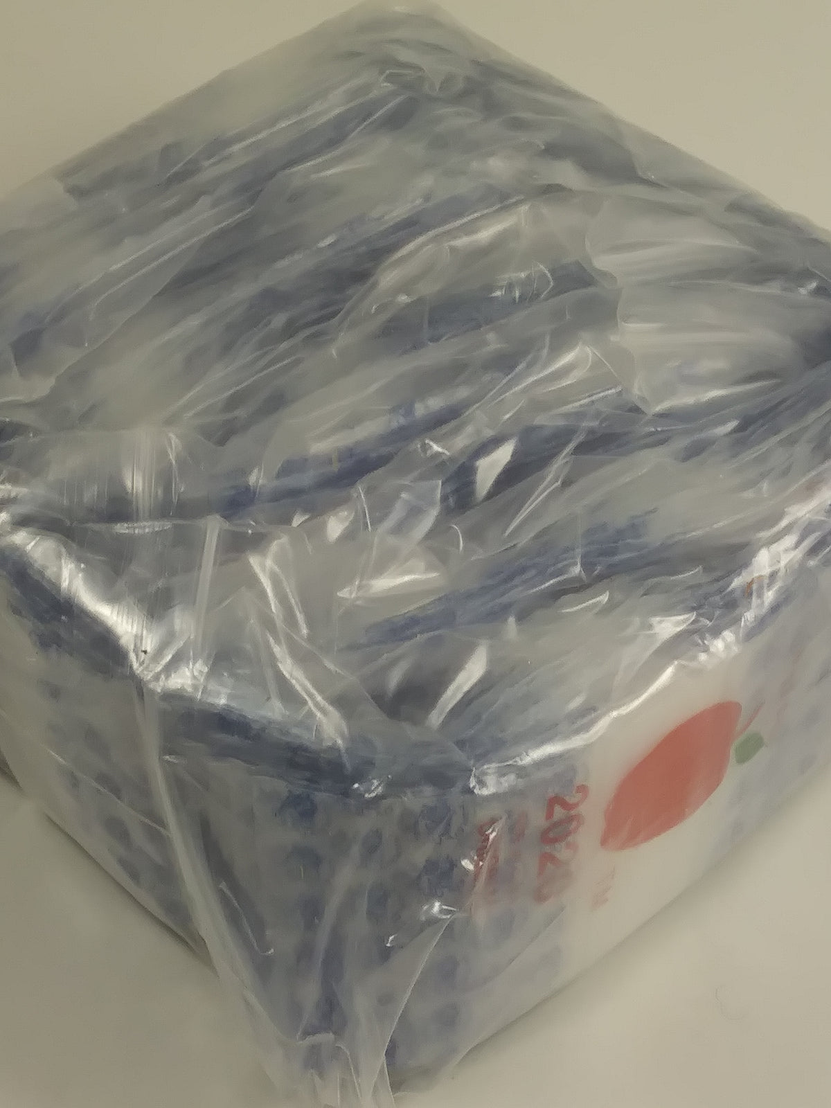 Original Apple Bags resealable bags, 2x2 inches, in smoky and fly designs, perfect for packaging and storage.