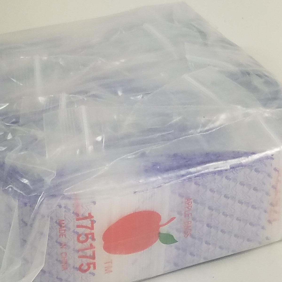 Resealable Original Apple Bags with heavy-duty 1.75 x 1.75-inch clear plastic design for secure storage.