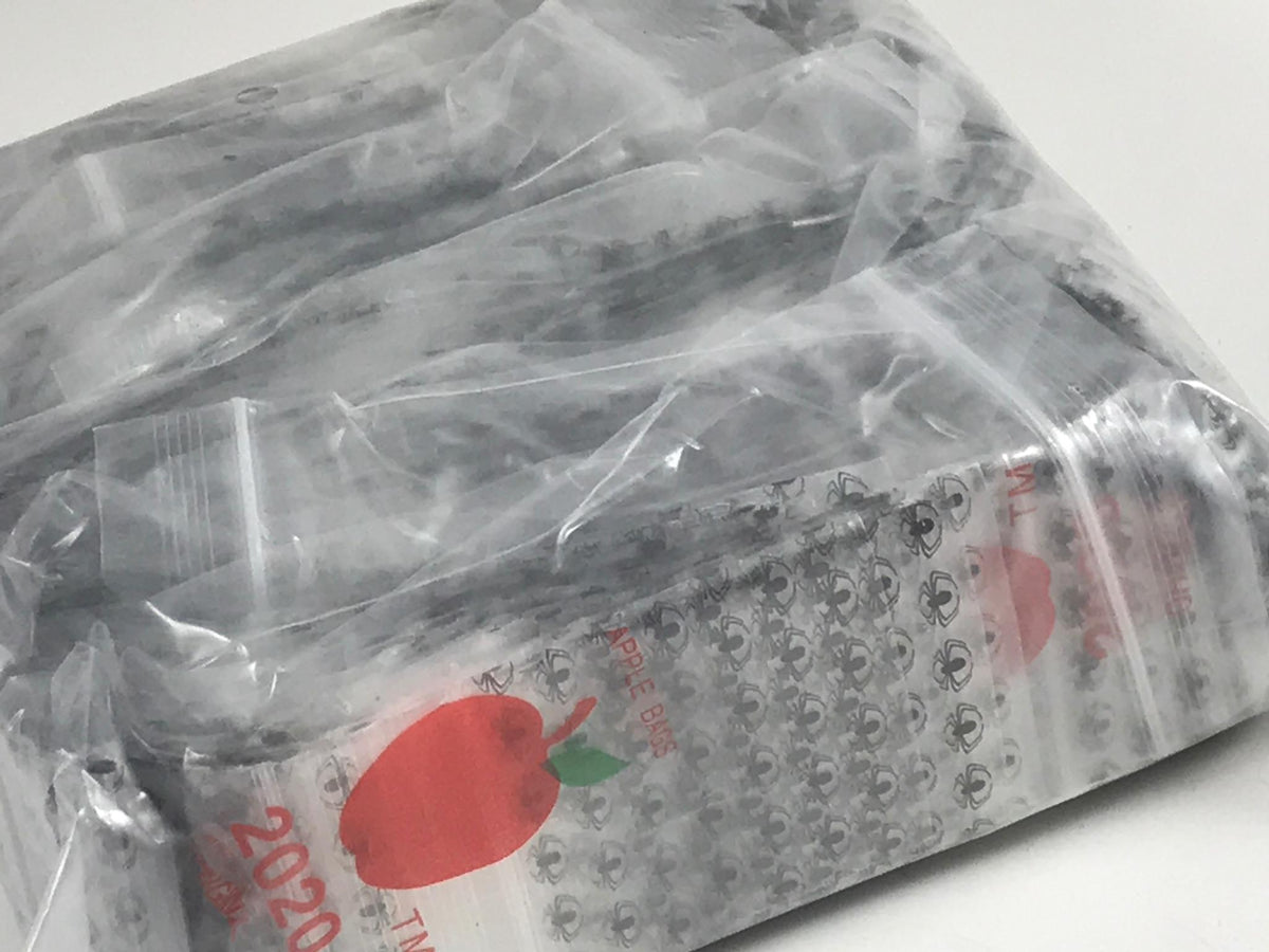 Black Spider design resealable Apple Bags, 2x2 inches, original brand, showing secure closure and detailed spider artwork.