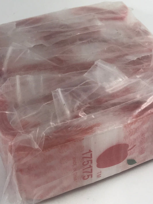 Original Apple Bags resealable basketball-themed plastic bags, 1.75 x 1.75 inches, ideal for storage or organization.