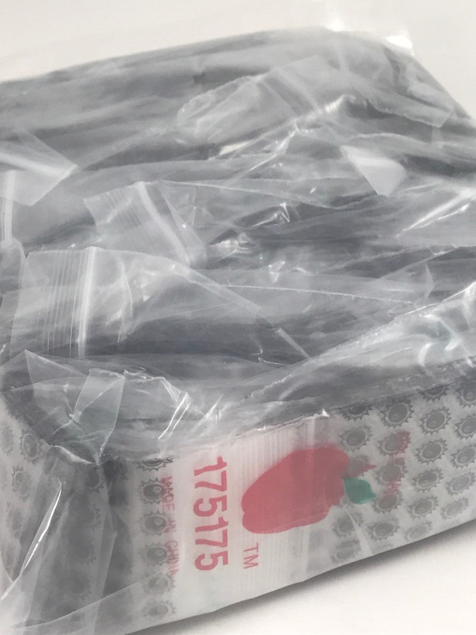 Set of eight resealable Original Apple Bags with 1.75-inch 8-ball design, ideal for packaging small items or candies.