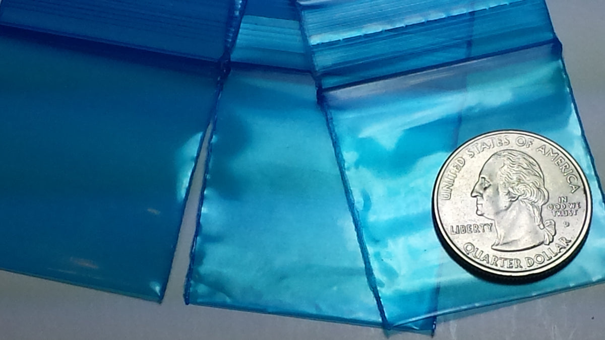 Blue 1.5 x 1.5-inch resealable Apple Bags by Original Apple Bags, small resealable storage pouches for various items.