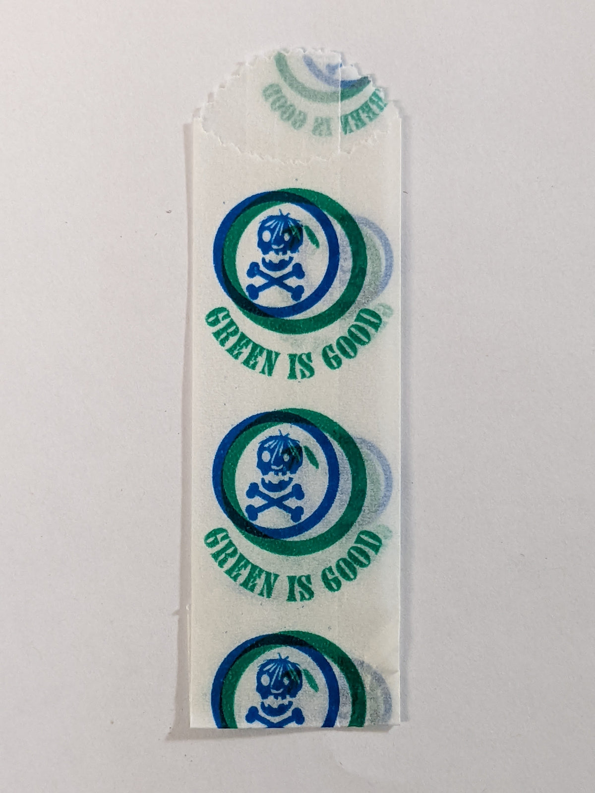 Green is Good vellum glassine stamp wax paper envelope bags by Stamp Collectors moisture resistant bags, showing sealed wax paper envelopes.