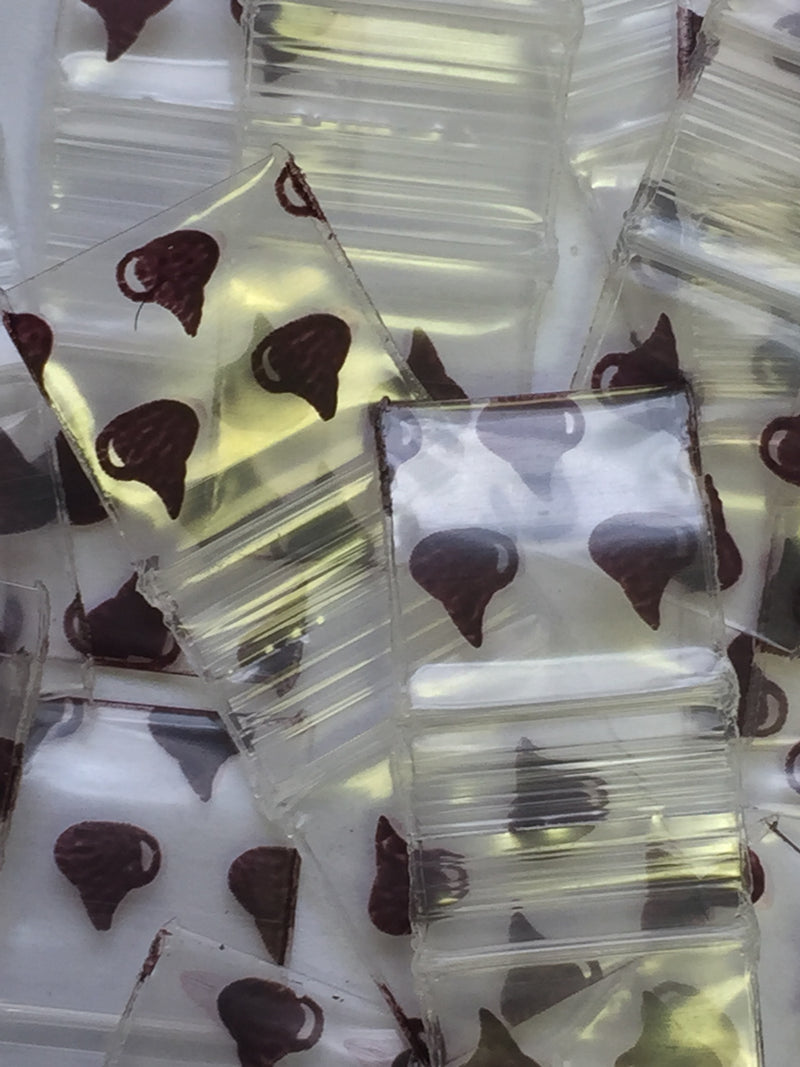 Chocolate brown Size 1212 original Apple bags from The Baggie Store, 1/2" x 1/2" dimensions, showing the sealed flexible plastic bags.