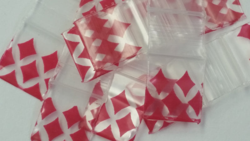Diamond-shaped 1212 original Apple bags from The Baggie Store, measuring 1/2" x 1/2" with a clear, flexible plastic design.