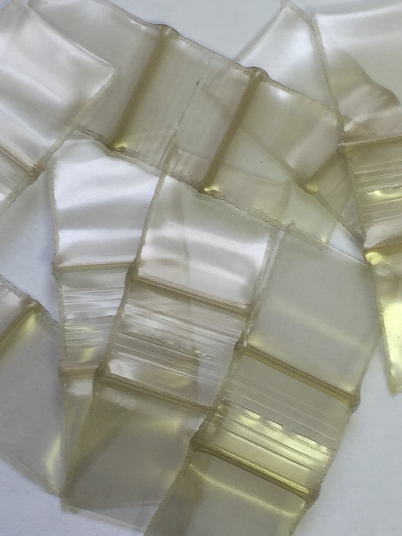 Gold SIZE 1212 Original Apple Bags from The Baggie Store, 1/2" x 1/2" dimensions, shown with sealed edges and transparent material.