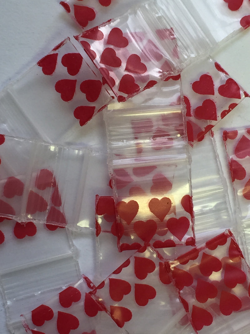 Original Apple Bags size 1212 by The Baggie Store, featuring a hearts design, measuring 1/2 inch by 1/2 inch.