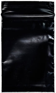 Black 2x3-inch resealable bags from Original Apple Bags, designed for packaging or storage purposes.