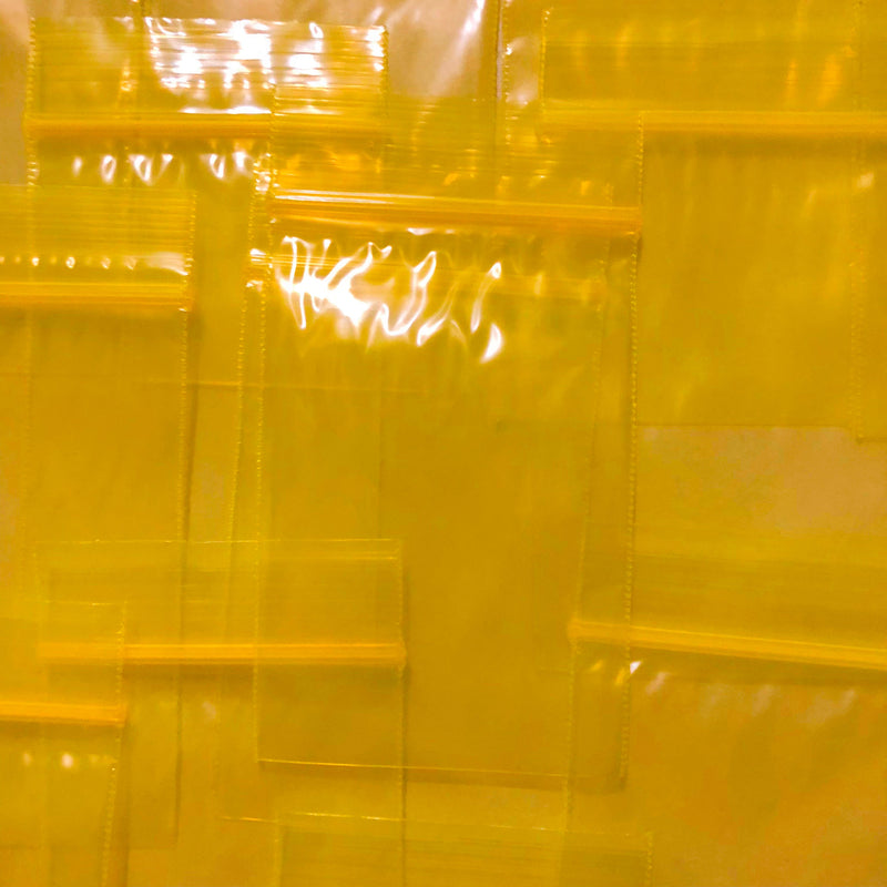 Yellow 2x3-inch resealable bags from Original Apple Bags, perfect for packaging and storage.