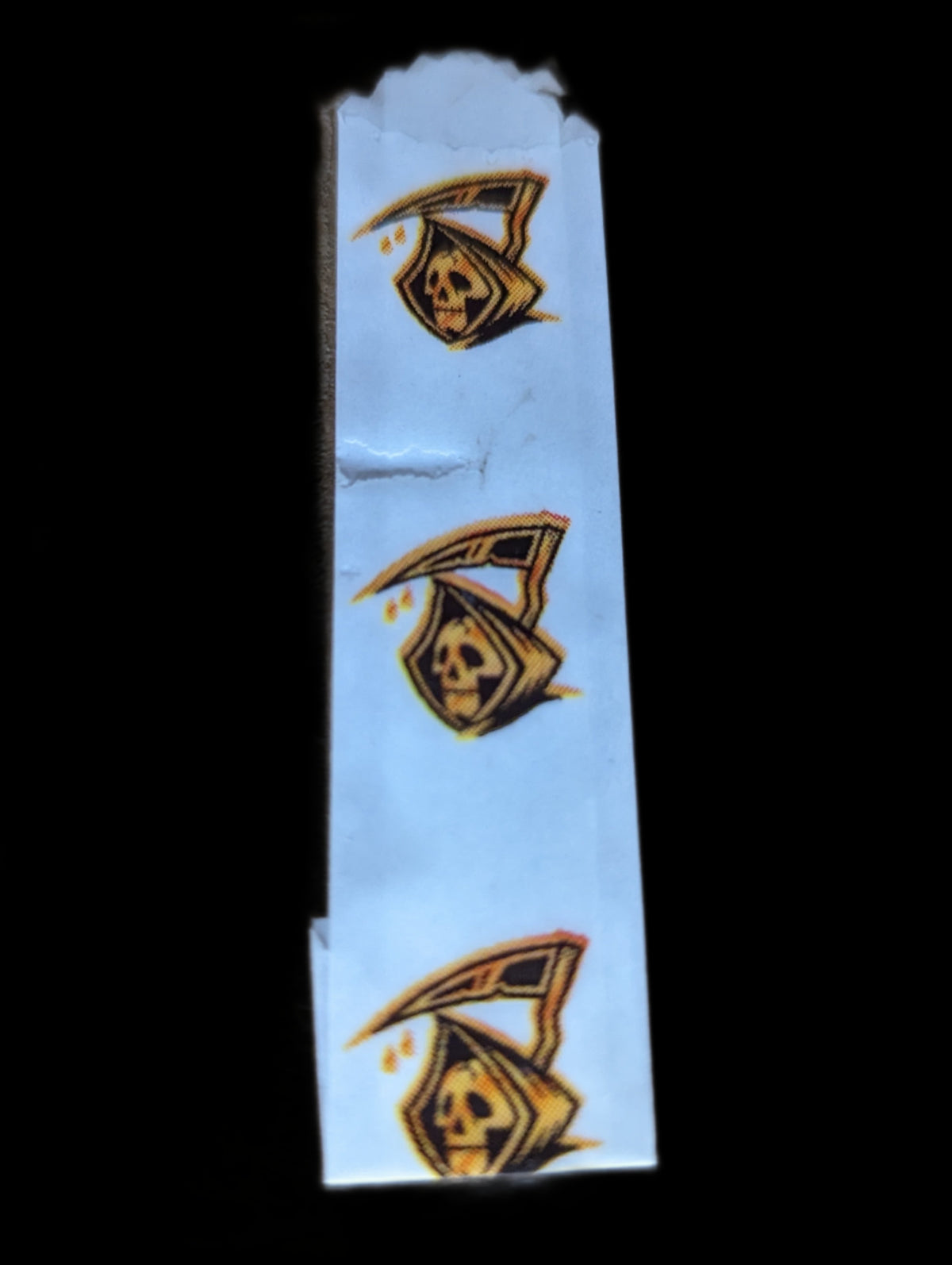 Vellum glassine wax paper envelope bag with Grim Reaper design, moisture-resistant Stamp Collectors Wax Bags for collectibles and storage.