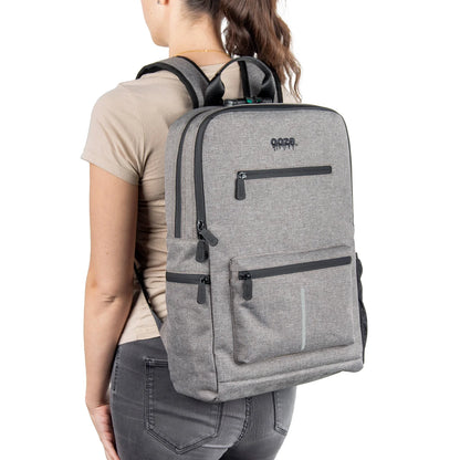 Ooze Traveler Classic smoke gray smell proof backpack with multiple compartments and padded straps for discreet carrying.