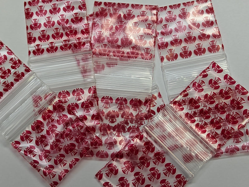Original Apple Bags 1.5x1.5 inches in red with Lobster design, perfect for packaging or gift wrapping.