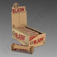 RAW 79mm rolling machine on a rolling tray, featuring the RAW brand logo and detailed metal construction.