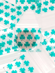 Original Apple Bags resealable bags with clover design, 1.25 x 1.25 inches, ideal for small storage or packaging.