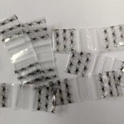 Black spider design resealable bags from Original Apple Bags, 5/8 inch by 5/8 inch, ideal for storing small items.