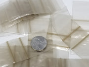 Gold resealable bags from Original Apple Bags, 1.25 x 1.25 inches, ideal for packaging small items or gifts.