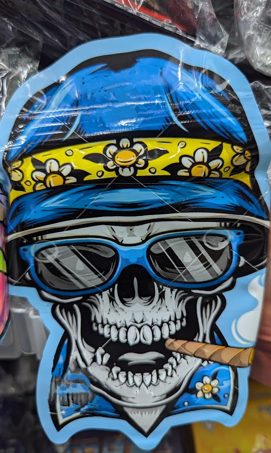 Smell proof Skull Smoking Mylar Bags by The Baggie Store, 50-pack, featuring black and white skull design, resealable storage pouches.