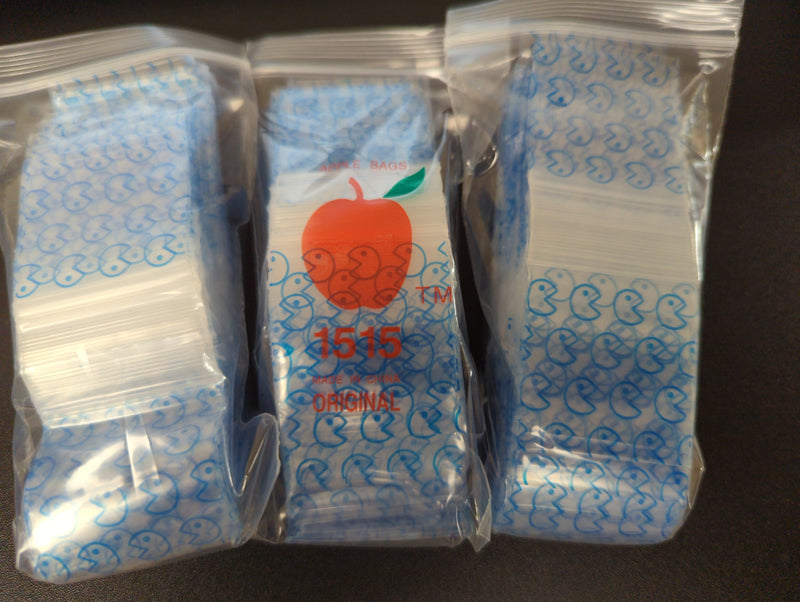 Blue Pacman Original Apple Bags, 1.5 x 1.5 inches, featuring playful Pacman design for packaging or gift wrapping.