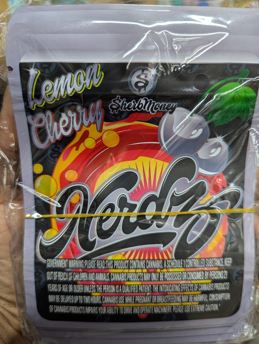 Smell-proof Lemon Cherry Nerdz candies in a pack of 50 bags, featuring colorful packaging and branding from The Baggie Store.